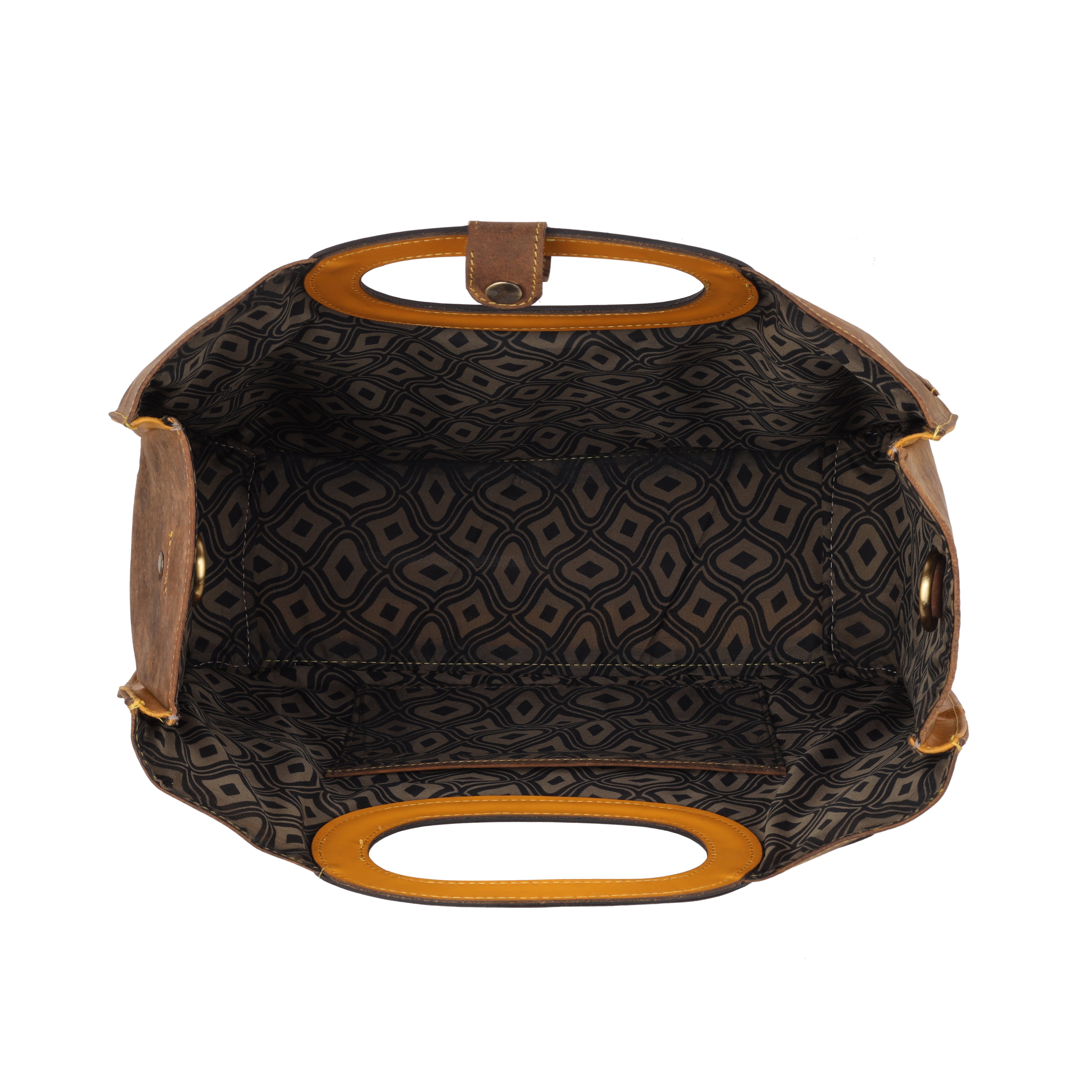 This unique tote bag features an intricate laser-cut floral pattern on rich brown leather, with a golden inner lining that shines through the cutwork for a striking effect