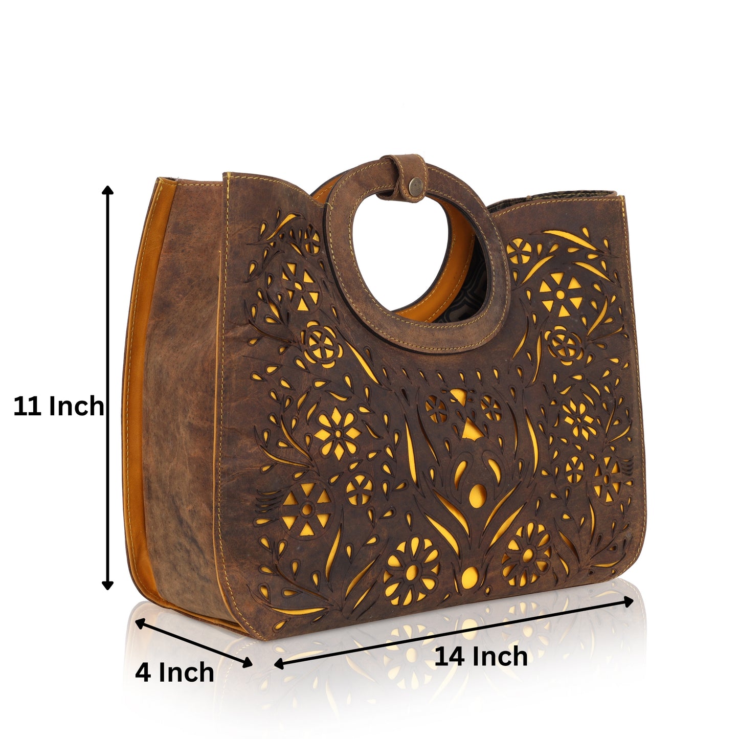 This unique tote bag features an intricate laser-cut floral pattern on rich brown leather, with a golden inner lining that shines through the cutwork for a striking effect
